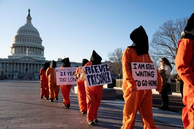 The US held migrants at Guantanamo before. Is Trump’s approach different?