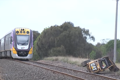 Passengers thrown a metre in the air after train collides with truck trailer in Australia