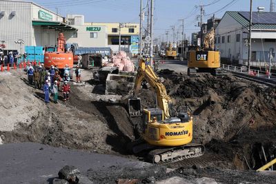 Japan drones find truck cabin swallowed by sinkhole with ‘person inside’