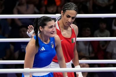 Algerian boxer Imane Khelif says she's 'never stayed down' and vows to fight back after lawsuit