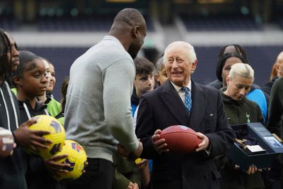 King Charles gets QB lesson at Tottenham Hotspur Stadium