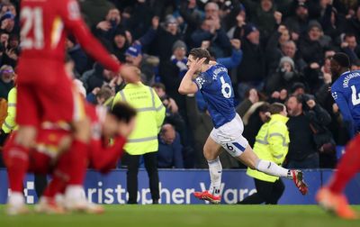 Everton 2-2 Liverpool: James Tarkowski scores last-gasp equaliser as Merseyside derby ends in mayhem