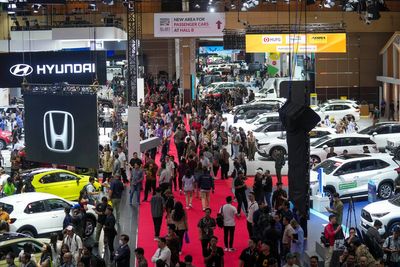 Electric cars and motorbikes star at Indonesia's motor show despite country's slow uptake