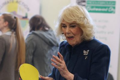 Queen takes part in table tennis match on community centre visit