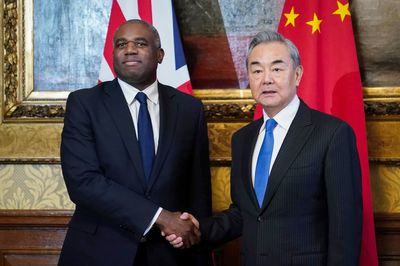 UK remains ‘robust’ with Beijing, Lammy says as he greets Chinese official