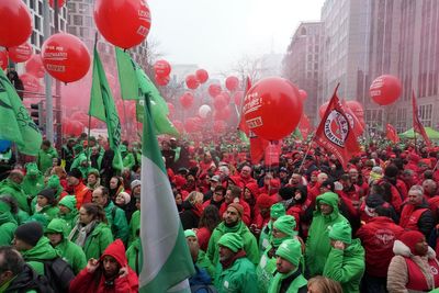 Close to 100,000 protest Belgian plans to cut social services in strategy to reduce debt