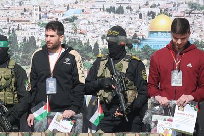 Moment Hamas releases three hostages from Gaza as ceasefire holds