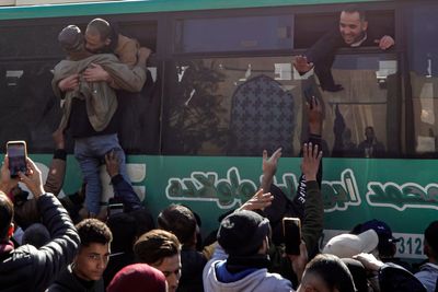 Buses carrying freed Palestinians welcomed by people in Gaza