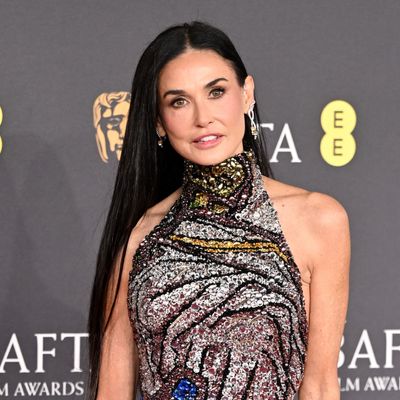 Demi Moore's Custom 2025 BAFTAs Red Carpet Gown Shimmers Like Stained Glass