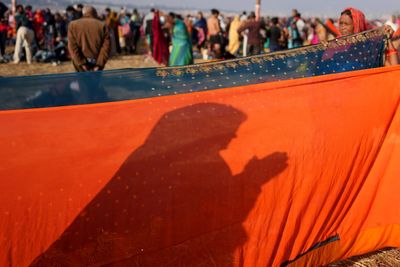 AP PHOTOS: The traditional sari is on colorful display at a massive Hindu festival in India