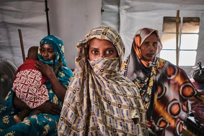 Young, old, refugees and returnees: thousands fleeing violence cross border into South Sudan