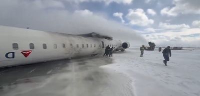 WATCH: Passengers Run Away From Upside-Down Delta Plane That Flipped In Toronto Airport