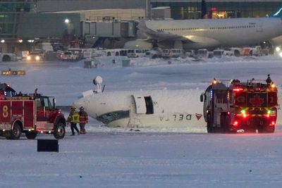 Toronto plane crash: Dramatic footage shows moment Delta jet bursts into flames as it flips on runway