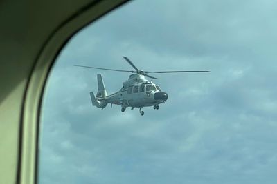 Chinese navy helicopter flies within 10 feet of Philippine patrol plane over disputed shoal