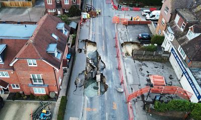 How do sinkholes form? What to know as 65ft crater appears on Surrey high street