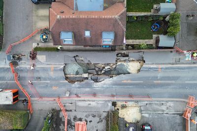 Couple plan to stay at home and ‘see what happens’ after giant sinkhole appears