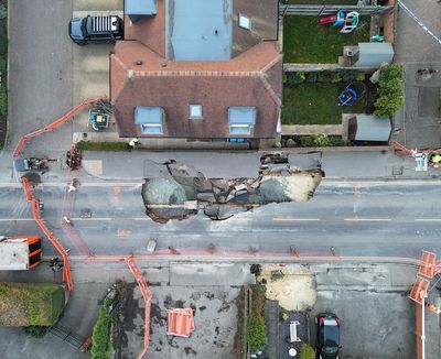 ‘It was like a TV show’: Massive sinkhole sparks ‘utter panic’ as homes evacuated in Surrey