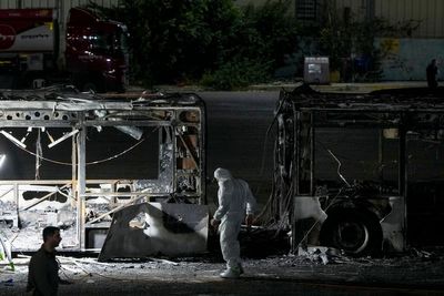 Israeli authorities scour bus after three explode in Tel Aviv