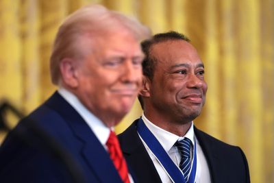 Tiger Woods fights back tears as Donald Trump reveals him as surprise guest at Black History Month event