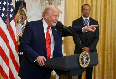 Trump fans chant ‘four more years’ as president bathes in praise and hypes Elon Musk’s DOGE at Black History Month event