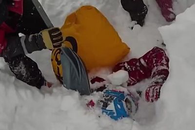 Snowmobiler buried under avalanche for more than an hour saved in rescue