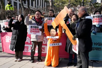 South Korean police book impeached president for obstructing execution of his arrest warrant