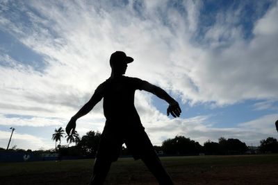 For Dominican baseball hopefuls, age fraud cases and a curveball from Japan reflect a broken system