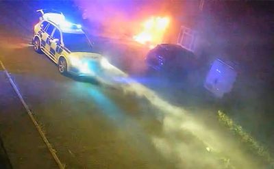 Dramatic bodycam shows moment hero police officer rescues woman from burning building