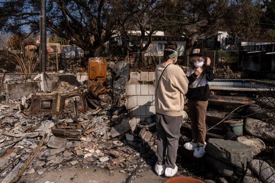 AP PHOTOS: Parents and kids navigate talks of loss and tragedy as they return home after LA fires