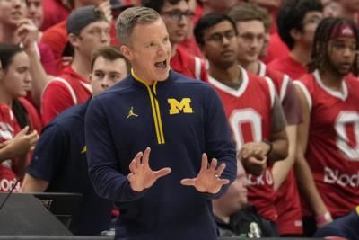 Michigan Extends Coach May's Contract After Strong Performance