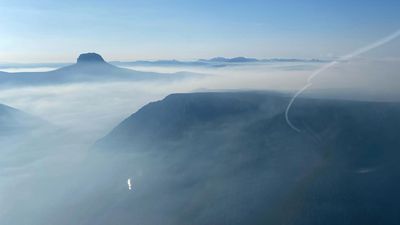 Cool change eases fire risk as popular track reopens