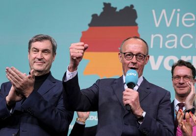 AP PHOTOS: Conservatives celebrate German election win as the far right sees historic success