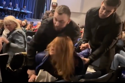 Idaho Republican town hall meeting descends into chaos after private security guards forcibly remove heckling woman