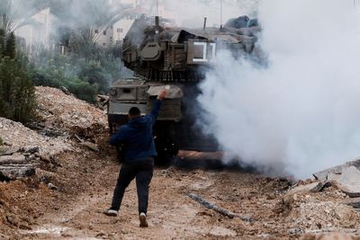 Why are Israeli tanks in the occupied West Bank?