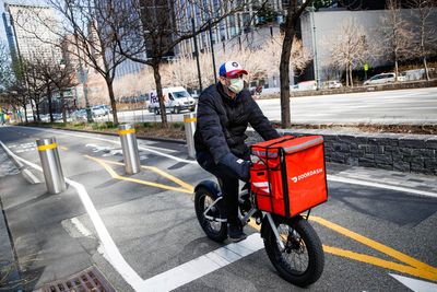 DoorDash to pay NY delivery workers $17 million for using their tips to cover wages