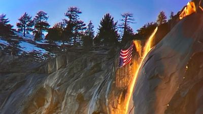 "There is nothing more American than our public lands" – climbers hang upside-down US flag during Yosemite's firefall to protest Trump hiring freeze