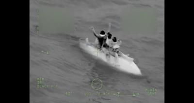 Coast Guard Rescues Three Boaters After Boat Capsizes