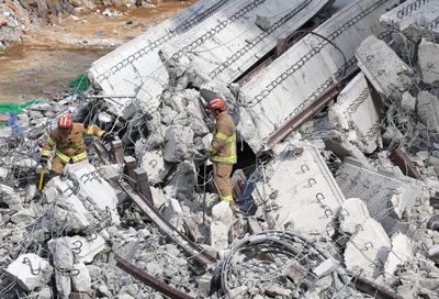 Four killed in South Korea road collapse