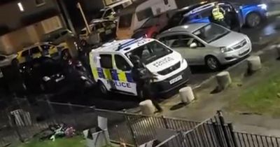 Armed police pictured at 'incident involving axe' on Glasgow street