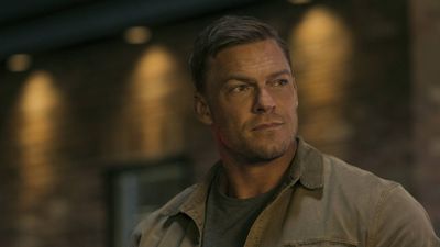 Reacher author says Alan Ritchson is better suited to the role than Tom Cruise because Cruise is "not huge and he's not scary"