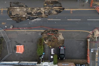 Sinkhole that wrecked Surrey street could take year to fix, residents told