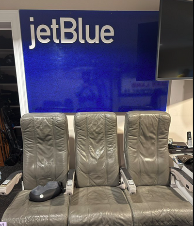 JetBlue Founder Trolled After Showing Off Home Theater Featuring 'Gross' Old Airplane Seats: 'Assume You Don't Watch TV More Than 2 Hours Straight'