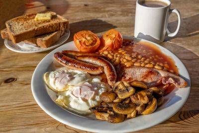 Eat two fewer fry-ups a week to help UK hit climate targets, Britons told