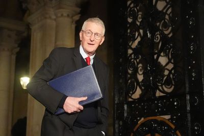 No question of paying any paramilitary group to disband, says Hilary Benn