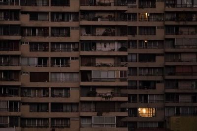 Electricity returns to most of Chile after a sweeping blackout, but questions remain