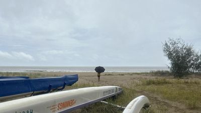 Damaging surf and high tides as cyclone spirals closer