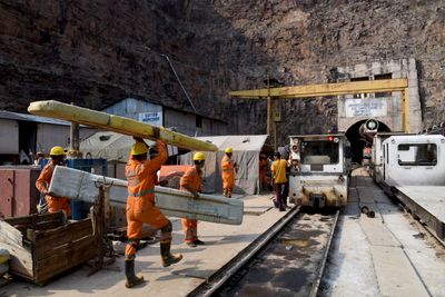 More rescuers join search for trapped workers in India’s tunnel collapse