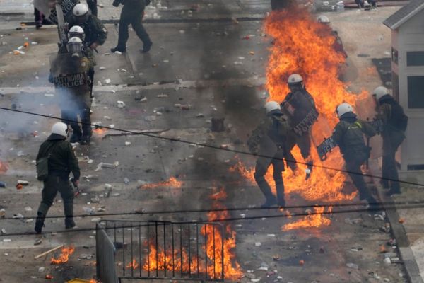 Greek police fire tear gas at protesters in Athens amid violent clashes on rail disaster anniversary