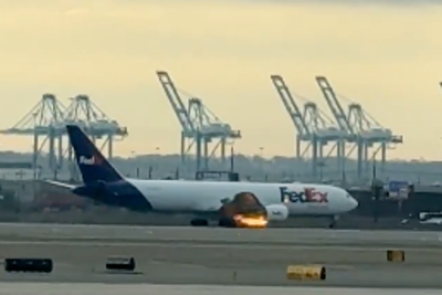 FedEx plane catches fire just after takeoff following birdstrike, forcing emergency landing at Newark Airport