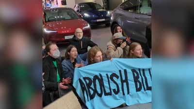 Elon Musk climate protesters removed from London Westfield Tesla showroom by security